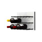 White acrylic wine rack with black pegs, holding yellow, red, and dark wine bottles