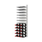 Black peg wine bottle wall rack on white back, holding dark bottles arranged in rows