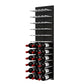 Black acrylic wine rack wall with light-colored pegs holding red and white wine bottles