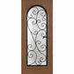 Wine cellar door with arched wrought-iron grille and scrollwork glass insert, warm brown wood