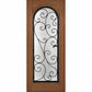 Warm medium-brown wine cellar door with arched glass panel and wrought iron grille