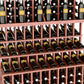 Close-up of wine bottle display shelves with reddish-brown frame holding bottles