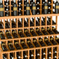 Triple-tier wine bottle display rack with light wood grid holding multiple bottles