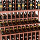 Triple-tier wine bottle display with reddish wood slats and wine bottles in rows