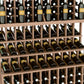 Triple-tier wine bottle display rack with double-deep base; light wood frame with multiple bottle tiers
