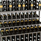Triple-tier wine bottle display rack close-up with dark bottles in wire bottle holders