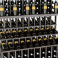 Close-up of triple-tier wine rack with dark bottles in wooden holders