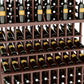 Triple-tier wine bottle display with walnut-brown lattice shelves holding green bottles