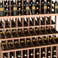 Close-up of wine bottle display shelves with bottles seated in staggered rows