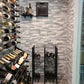A wine room featuring a Case and Crate Bin with a Syrah Shelf