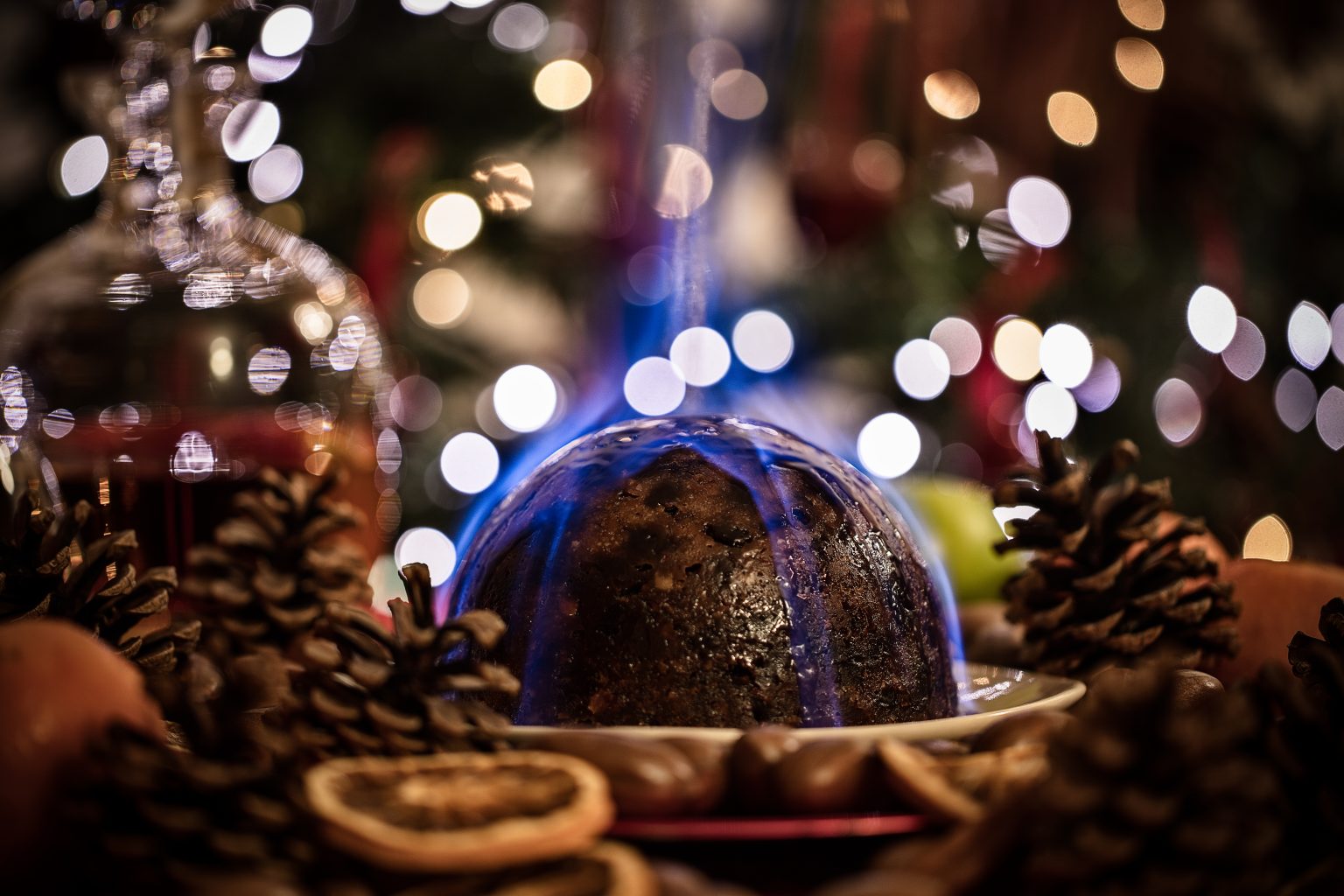 festive christmas pudding on fire in a traditional setting - WineCellars.com®  We Design 